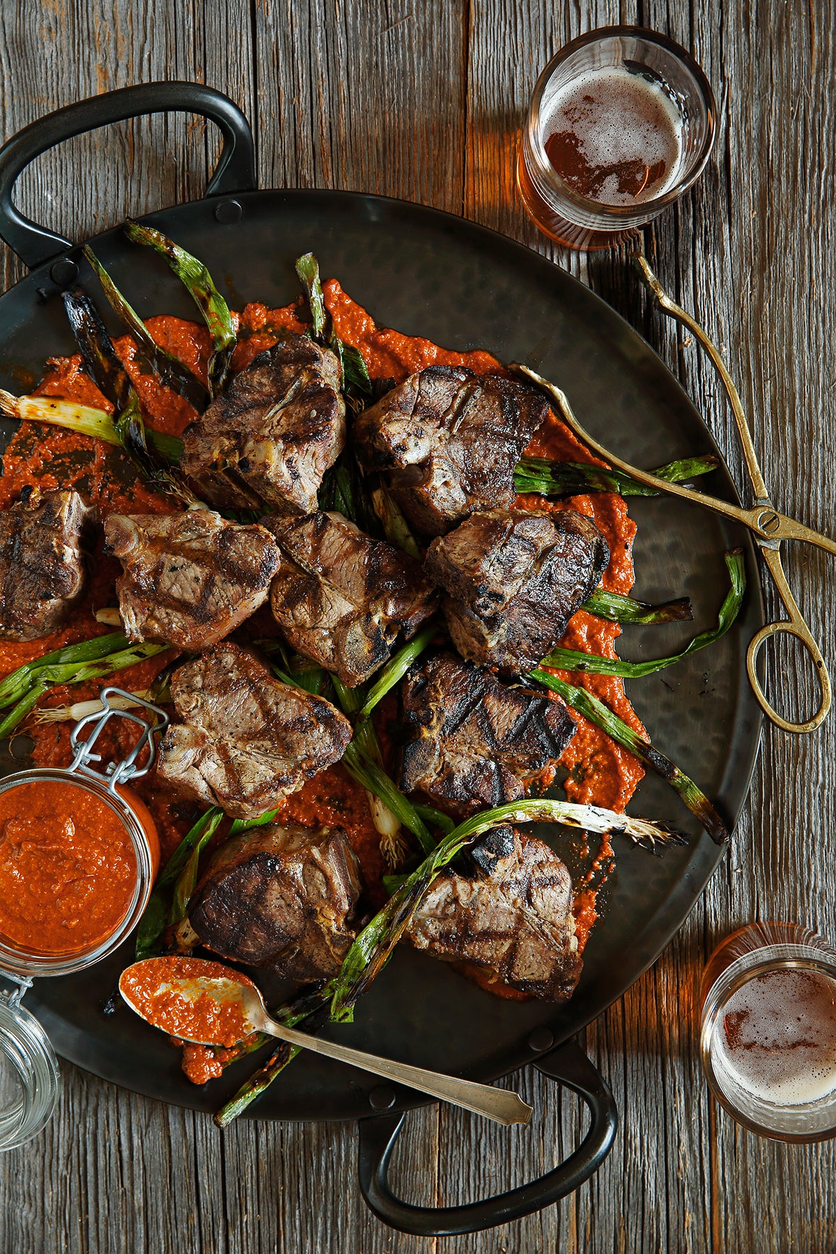 Finger Lickin’ Lamb Loin Chops with Romesco Sauce & Grilled Scallions