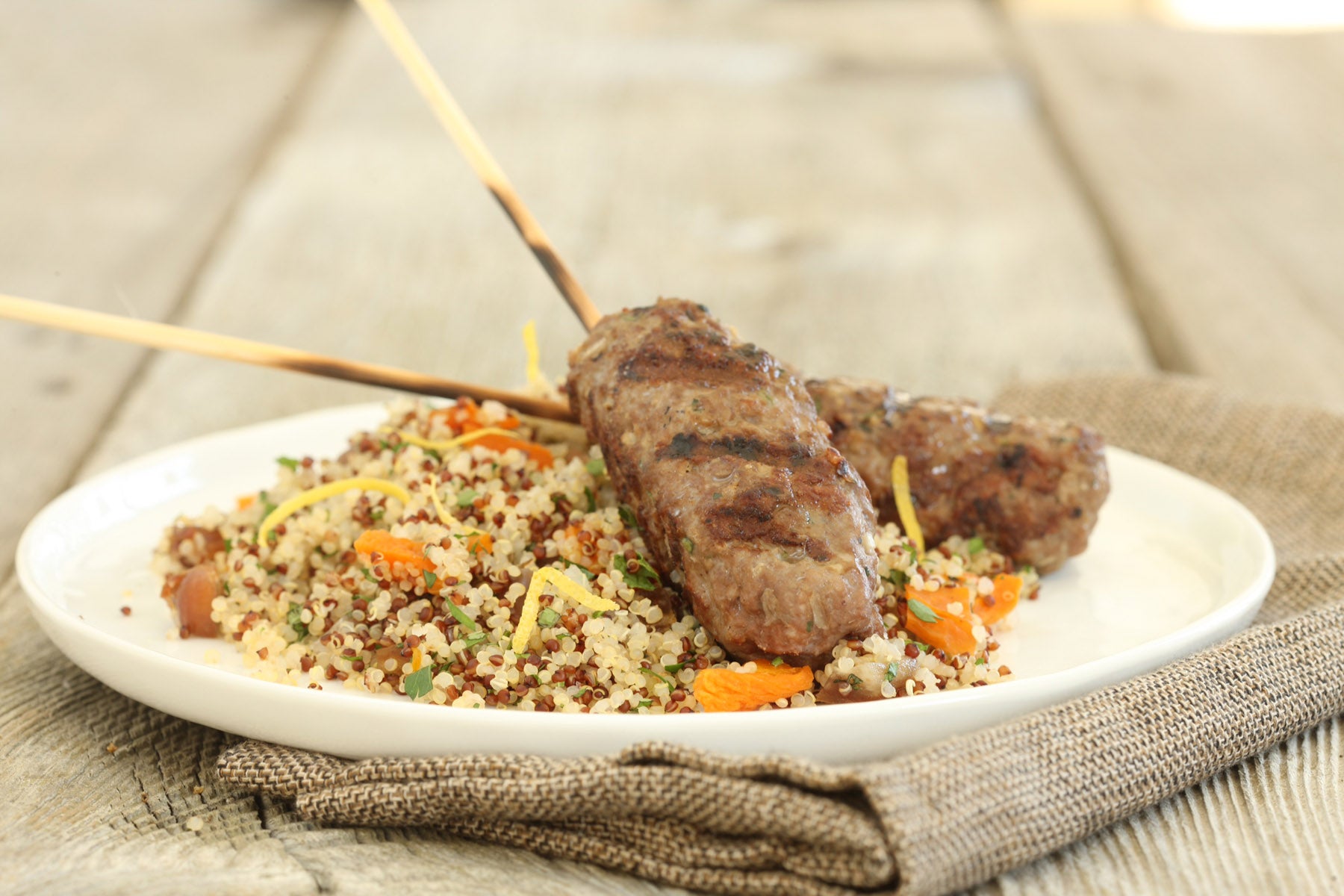 Ground Lamb Kabobs with Dried Fruit-Mint Quinoa