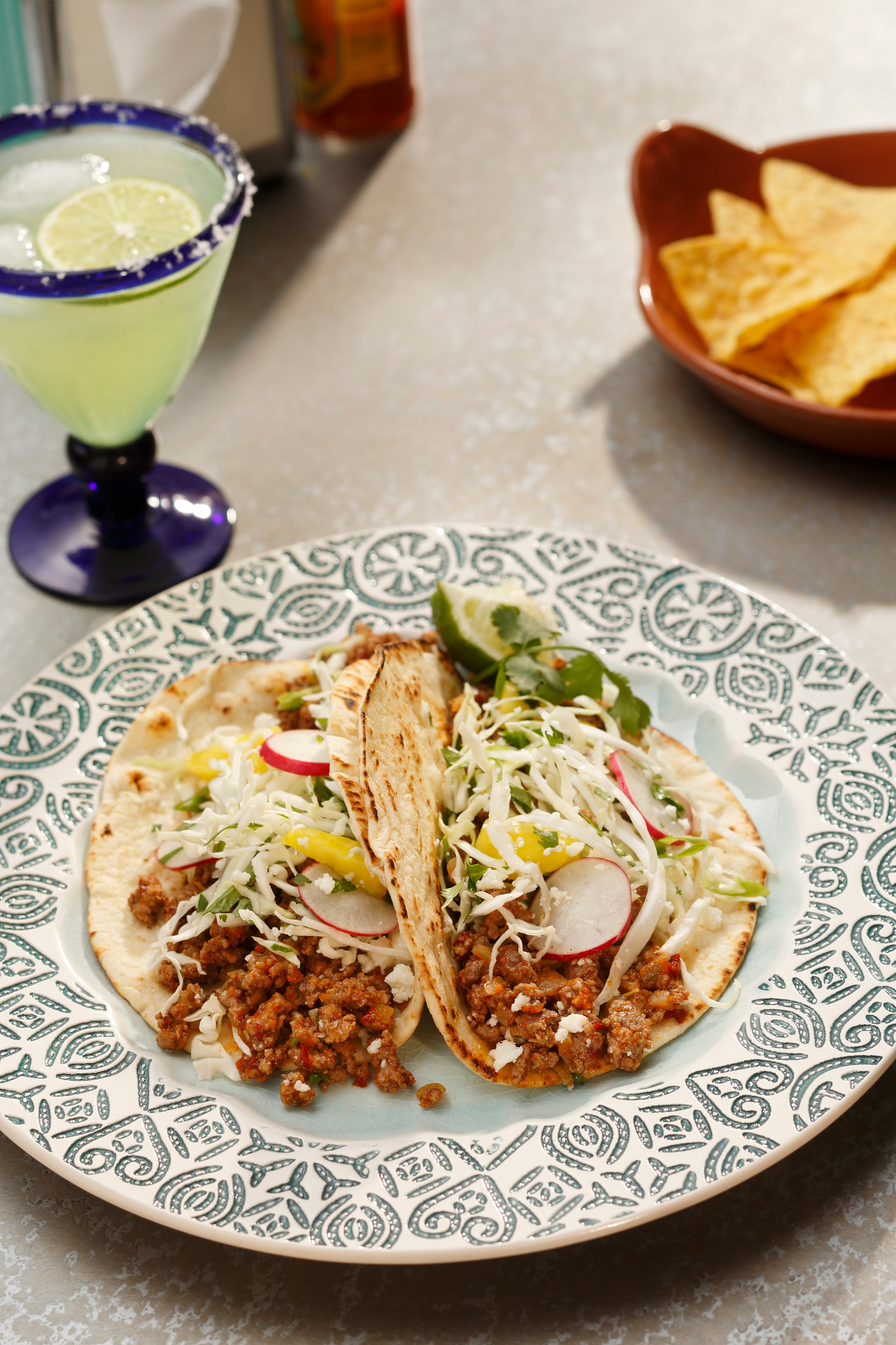 Spicy Chipotle Lamb Tacos with Cabbage, Radish & Pineapple Slaw